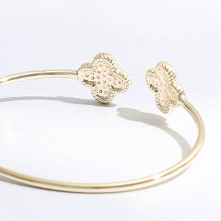 Gold Tone Wire Bracelet with CZ Clover Ends – One Size